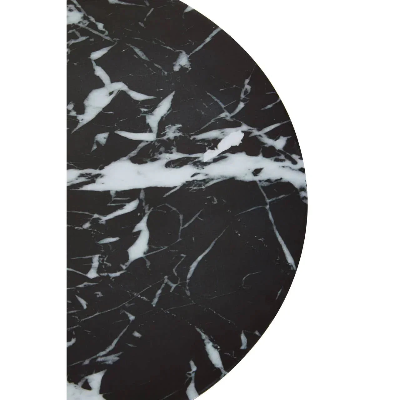 Round black marble table top with white veining close up