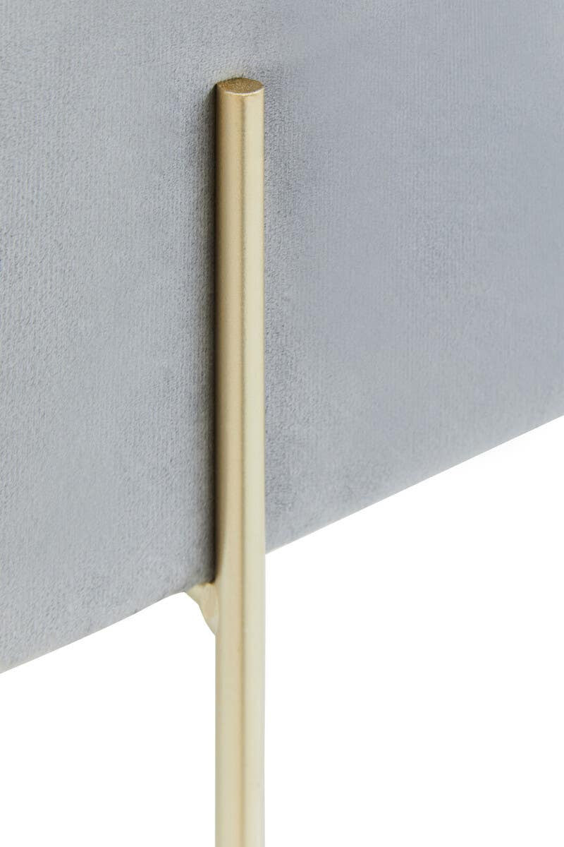 Square grey velvet stool with a sleek design, featuring a soft fabric surface and a minimalist gold metal leg. The leg has a slender profile, adding a modern touch to the overall aesthetic