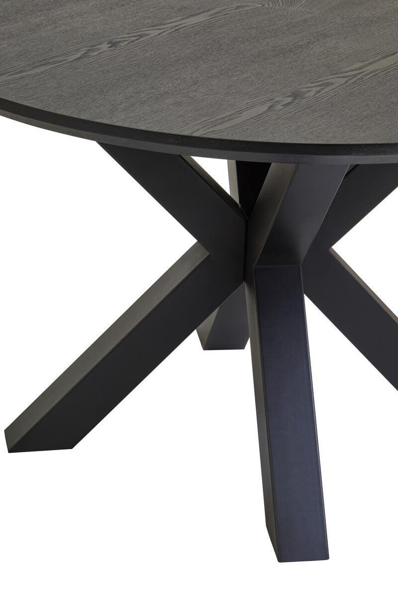 Round black dining table with wood grain top and angled metal legs