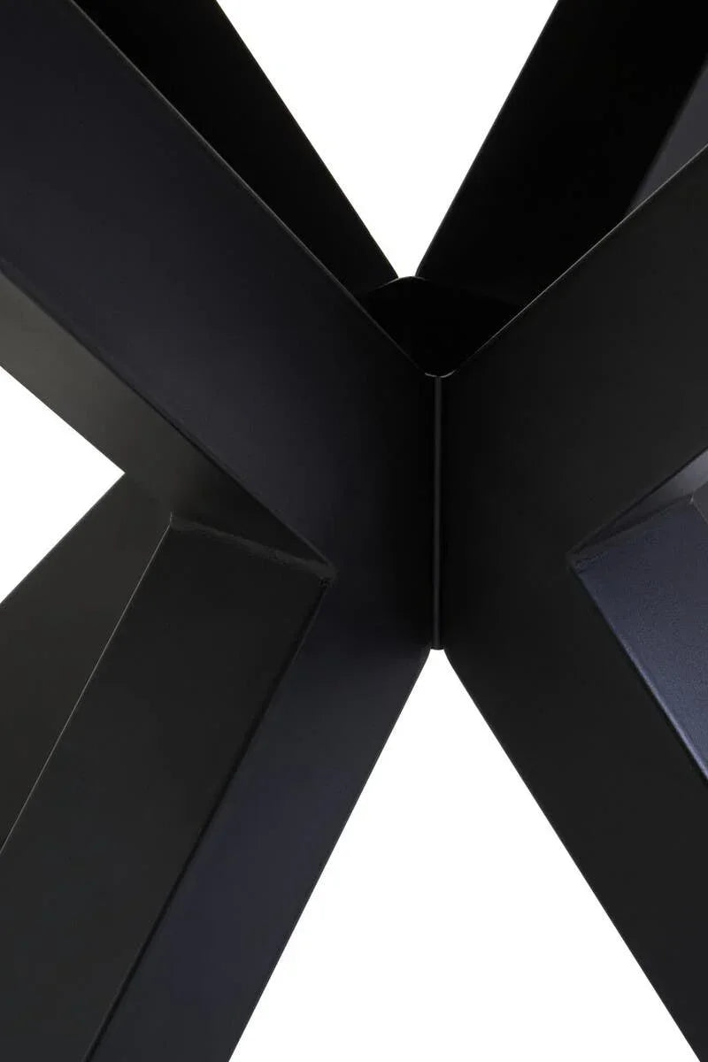 Black metal table leg cross frame close-up