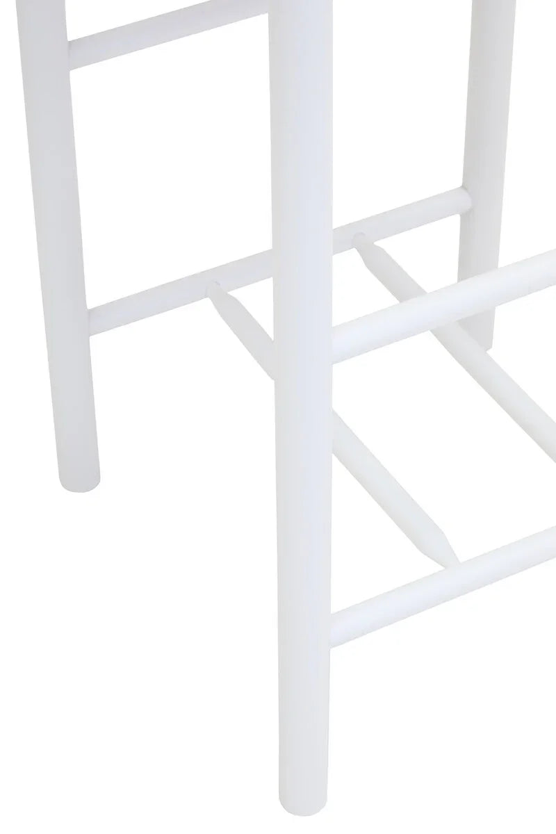 White wooden stool legs and footrest close-up