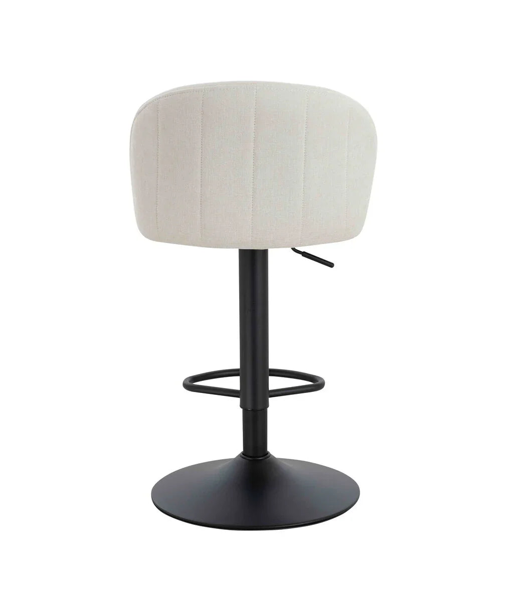 Beige fabric bar stool with black metal base and footrest, rear view