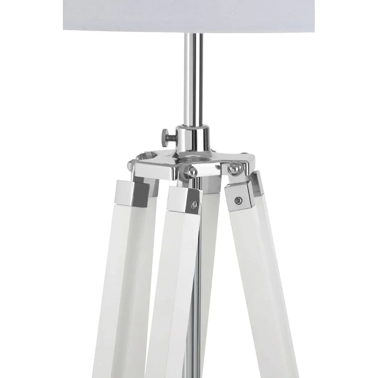 White tripod table lamp with chrome accents and adjustable legs, close-up view