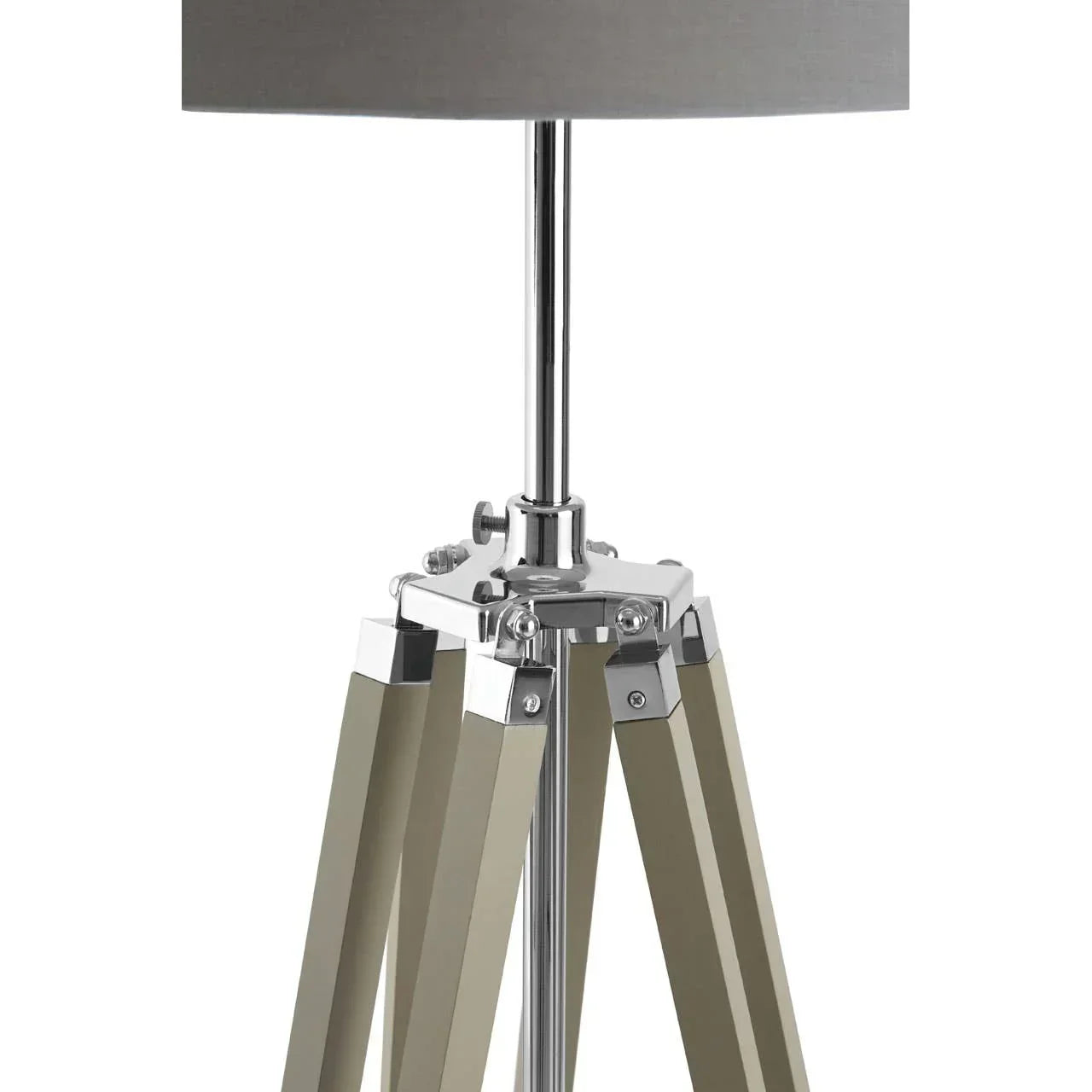 Tripod floor lamp with chrome and wood legs and grey fabric shade close-up