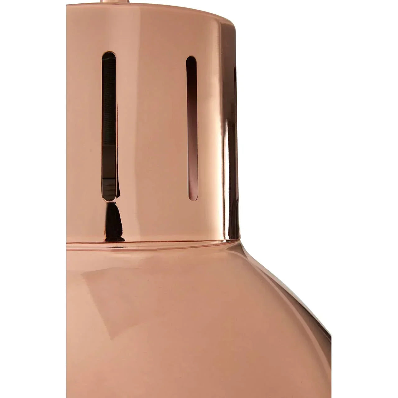 Close-up of copper metal pendant light shade with vertical ventilation slots