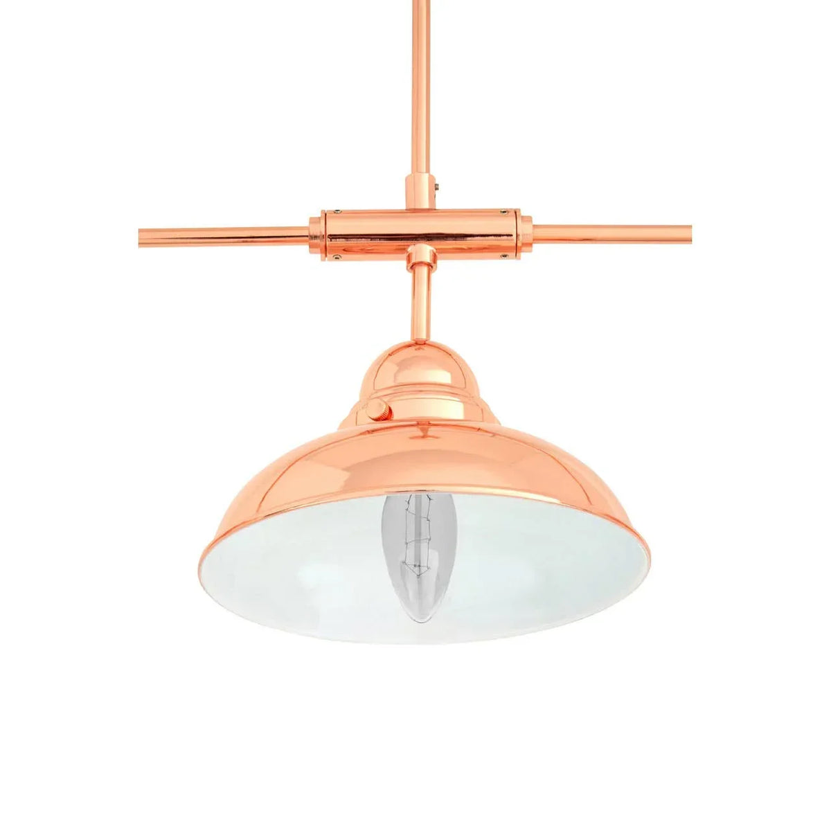 Copper pendant light with wide dome shade and exposed bulb, shown from below