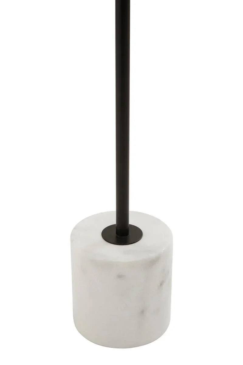 Modern floor lamp with black pole and round white marble base