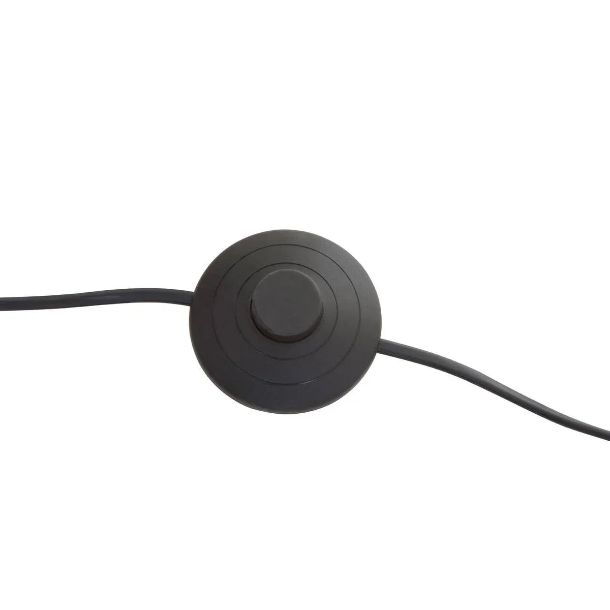 Black floor lamp foot switch with round button and cable on white background