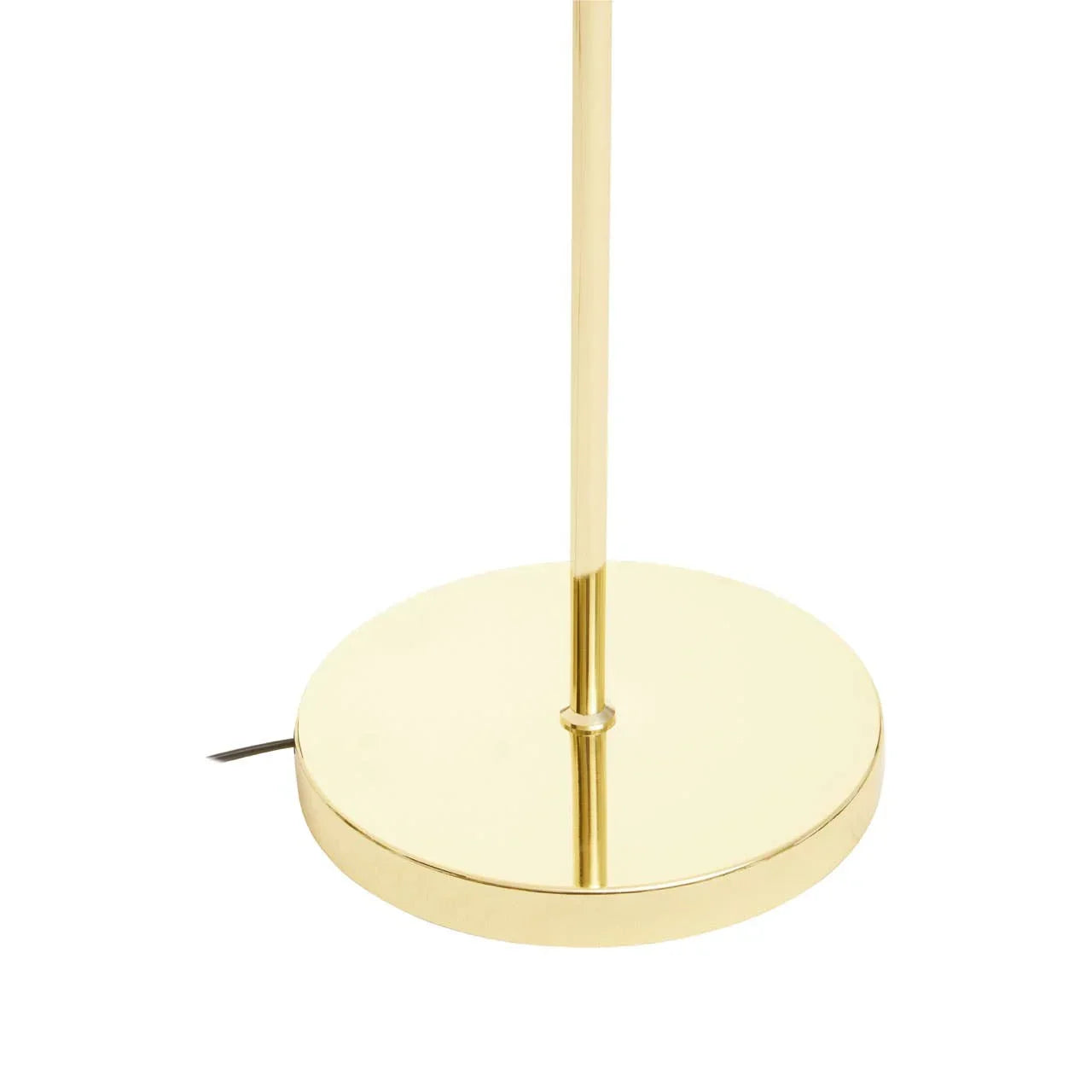 Gold metal lamp base with slim stand and visible power cord