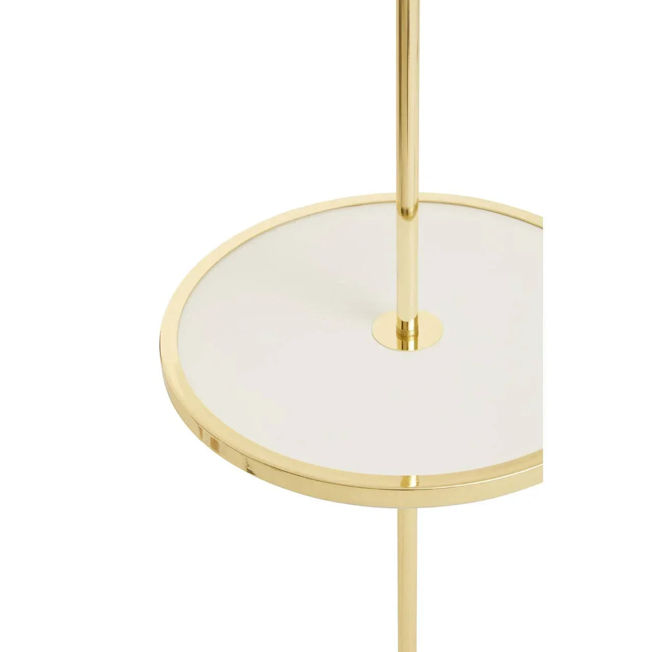 Gold metal side table with round glass shelf, close-up of frame and surface