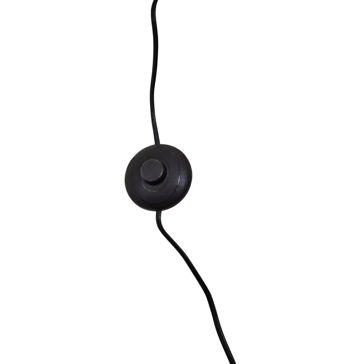Black floor lamp foot switch on a black power cord against white background