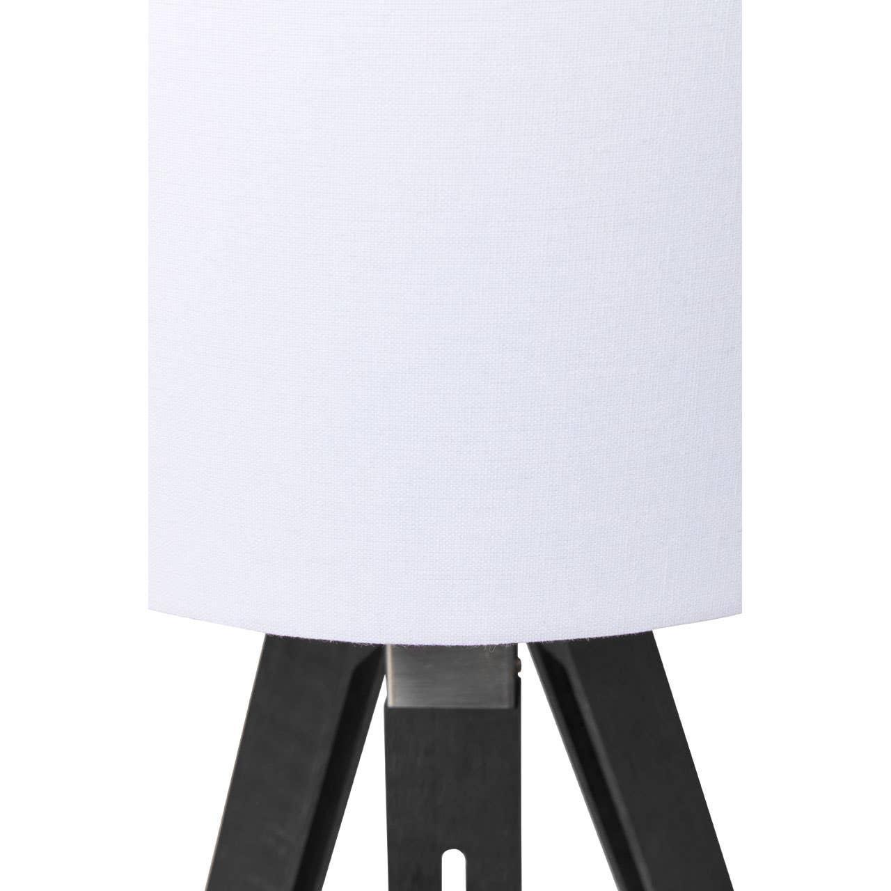 Close-up of white lamp shade with black wooden tripod legs