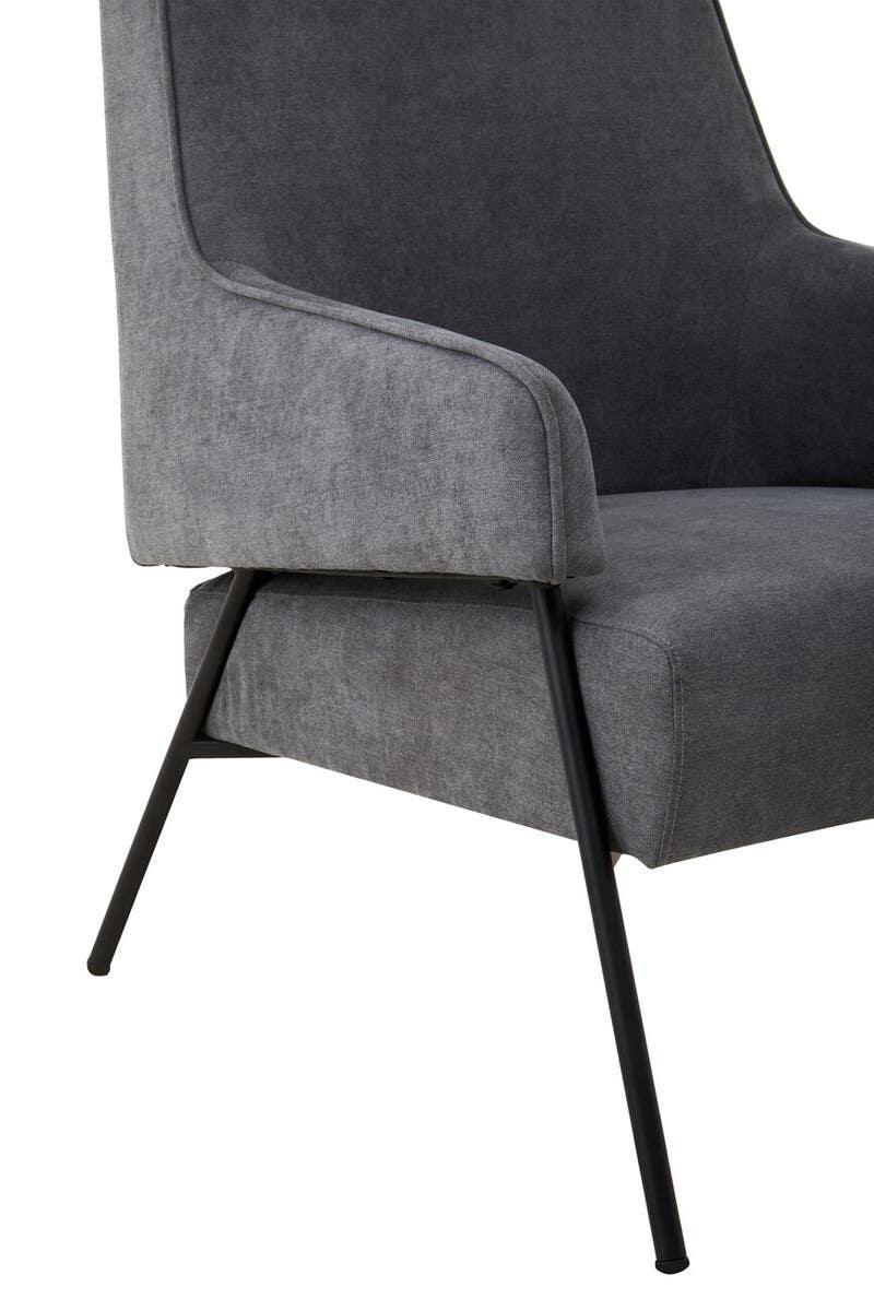 Grey fabric accent chair with black metal legs and arm detail, side angle view