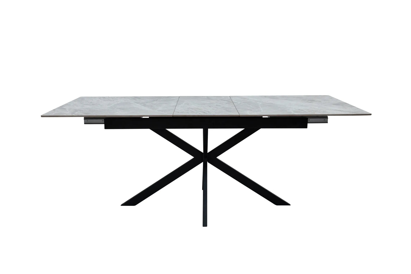 A modern rectangular dining table with a gray stone-look top and a black metal X-frame base, shown against a plain white background.