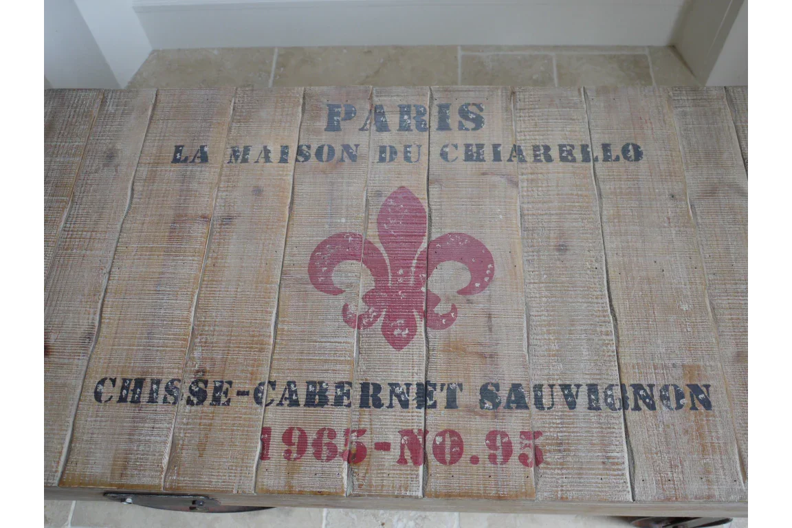 Rustic wooden coffee table top with printed Paris vintage wine crate design and fleur-de-lis