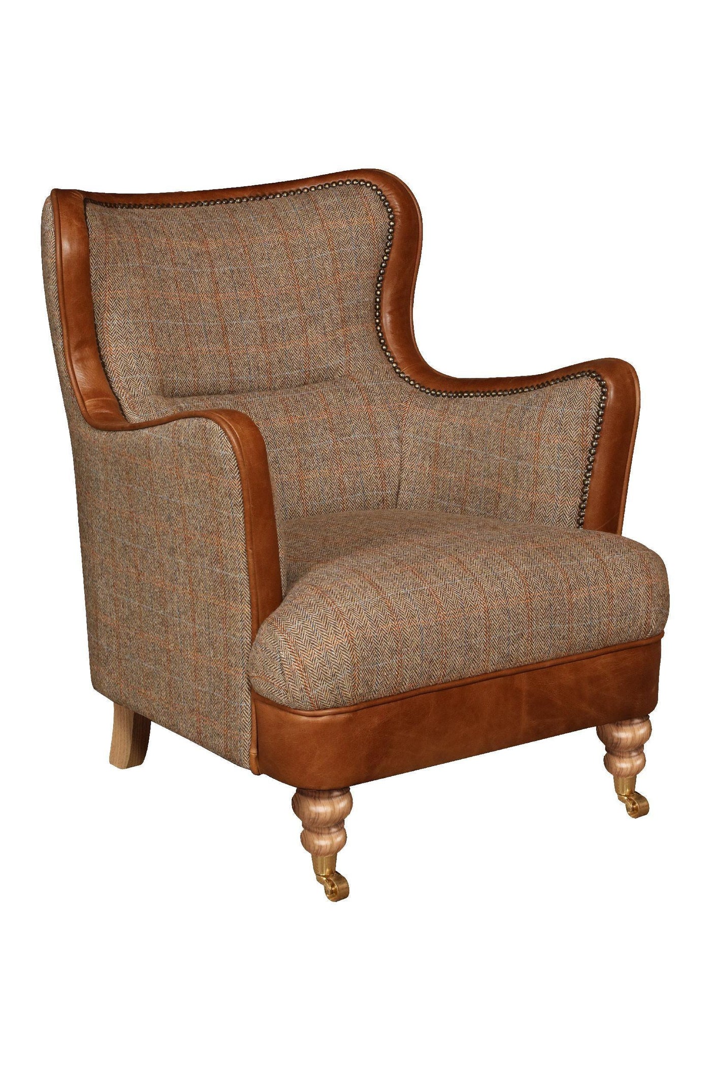 Herringbone fabric armchair with brown leather trim and wooden legs, front angled view