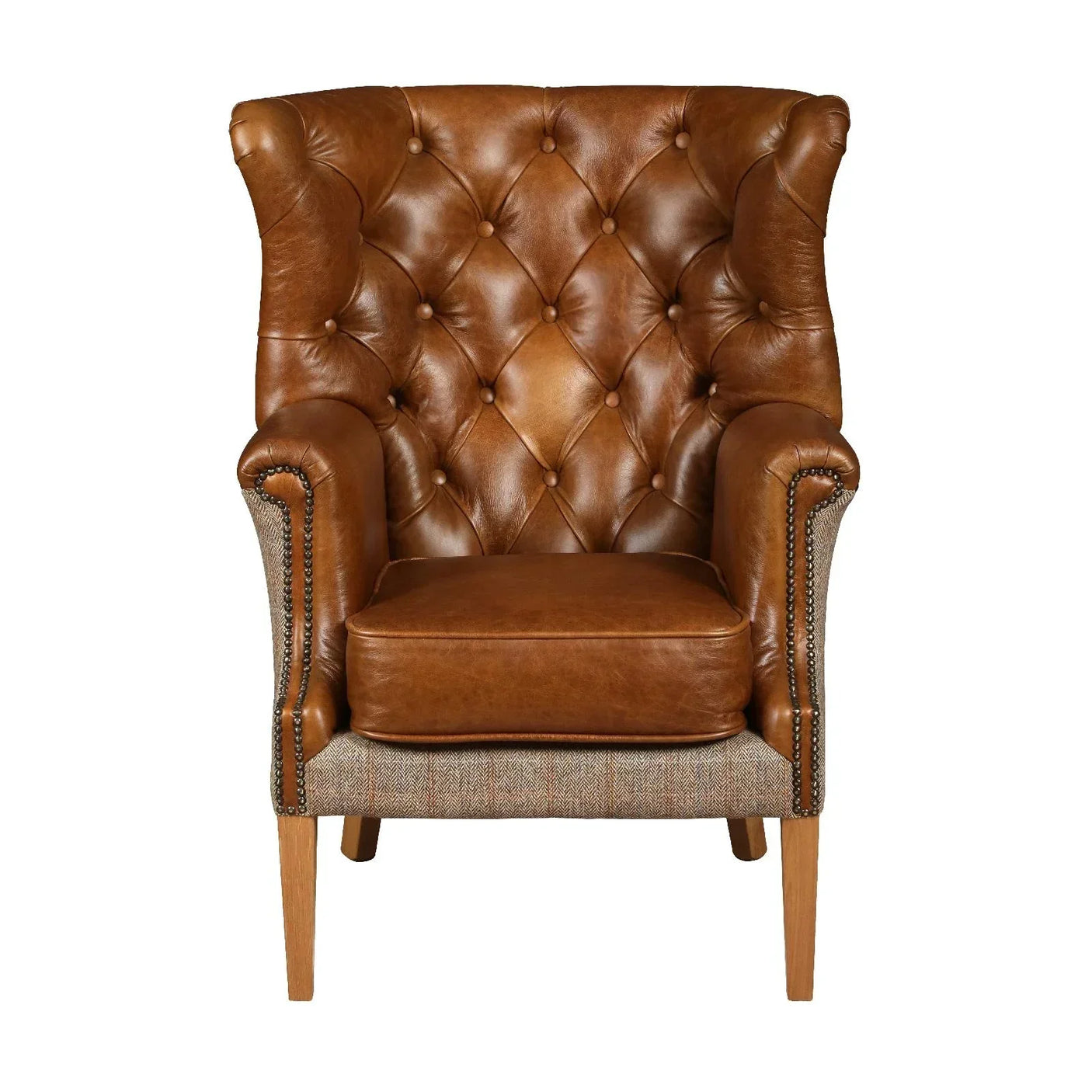 Brown leather armchair with tufted backrest, wooden legs, and studded detailing