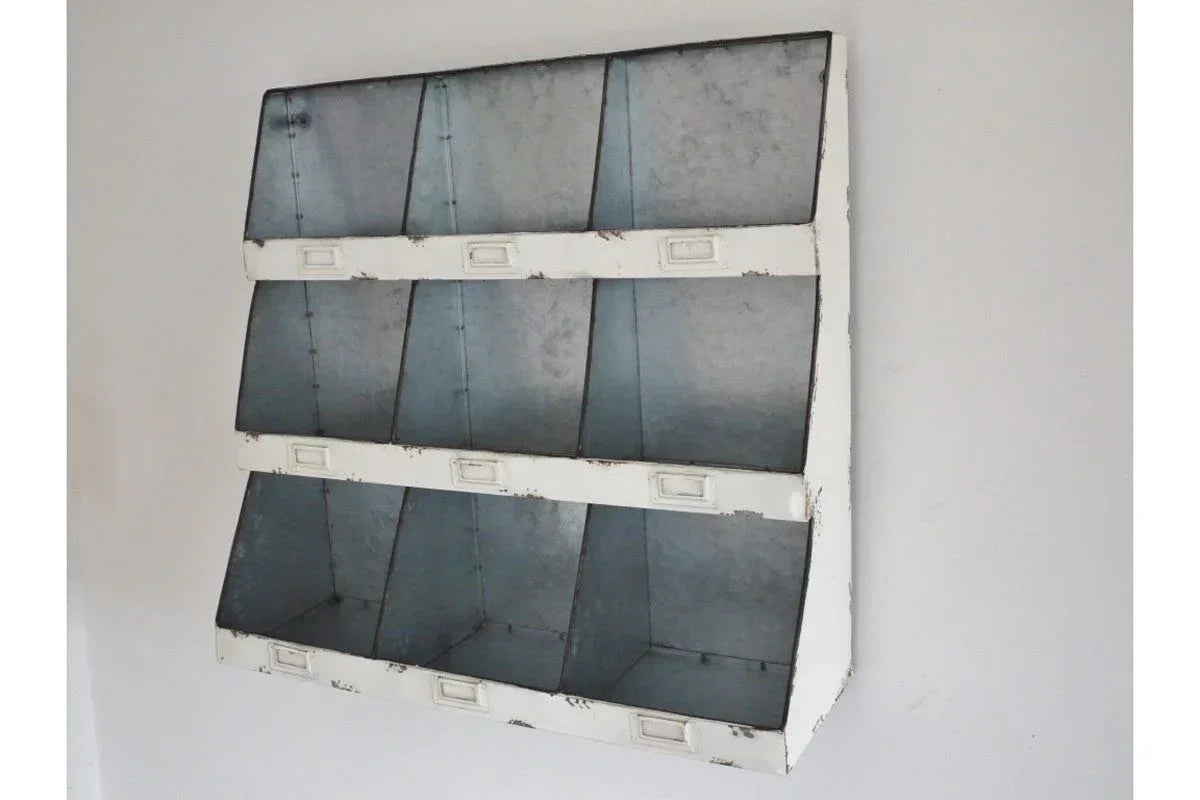 Wall-mounted metal storage organizer with nine vintage compartments and white trim