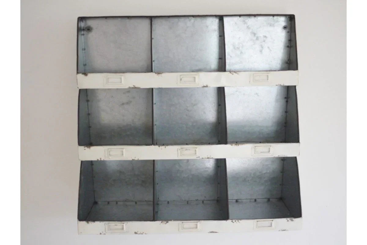 Metal wall storage organiser with nine cubby holes and distressed white trim