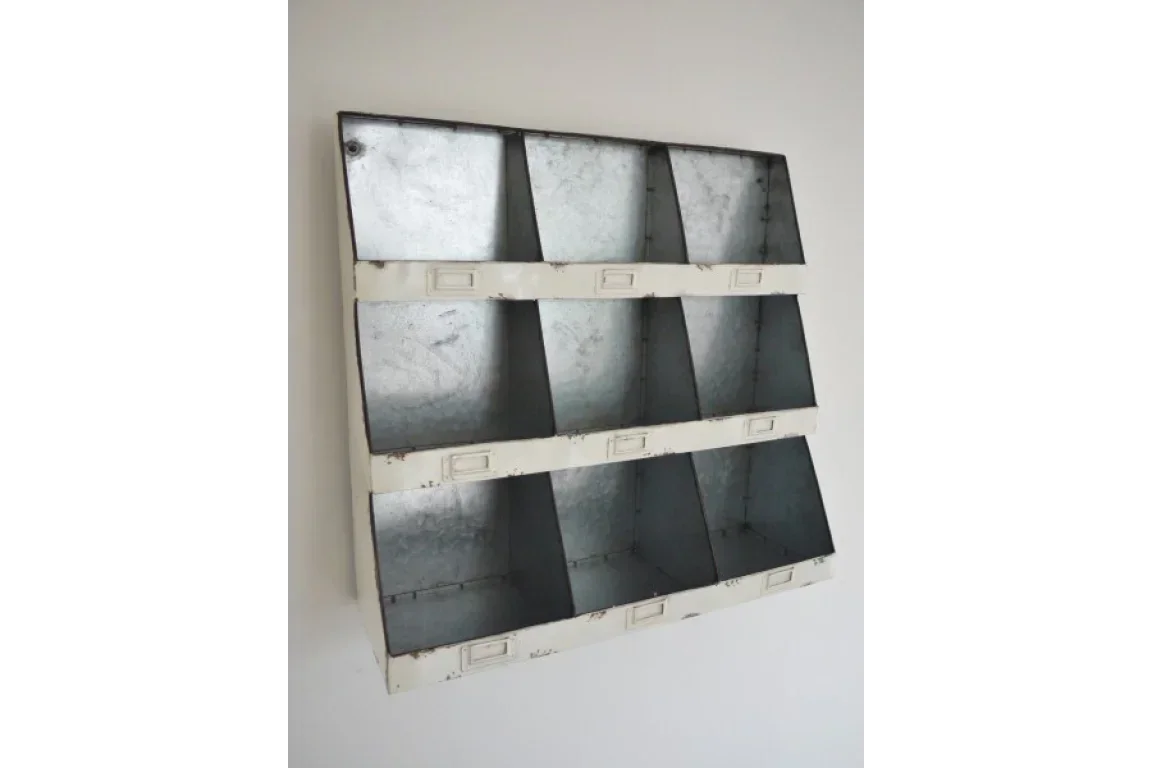 Industrial metal wall storage unit with nine compartments and label holders, angled view