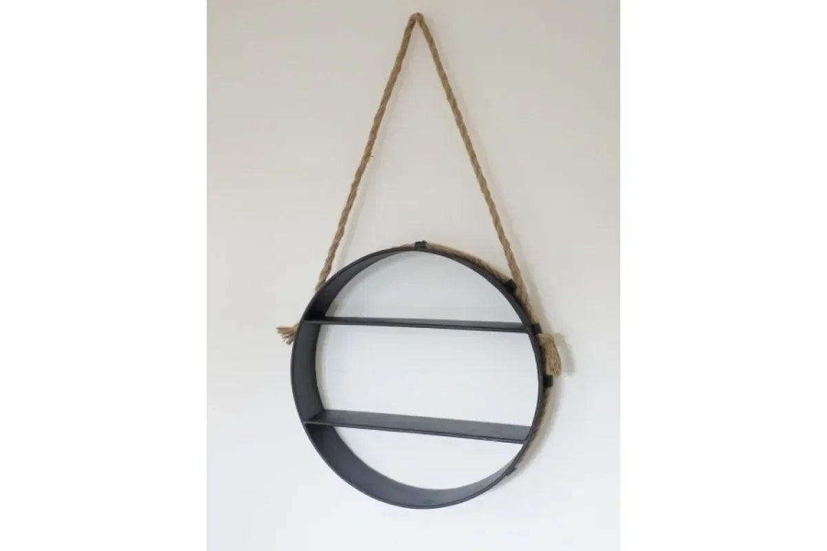 Round metal wall shelf with rope hanging detail and two shelves against white background