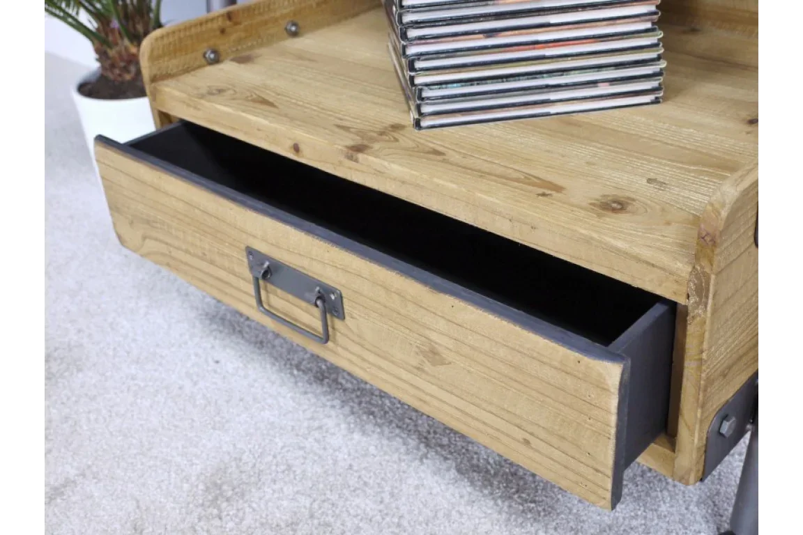 Wooden coffee table with open storage drawer and metal handle on carpeted floor