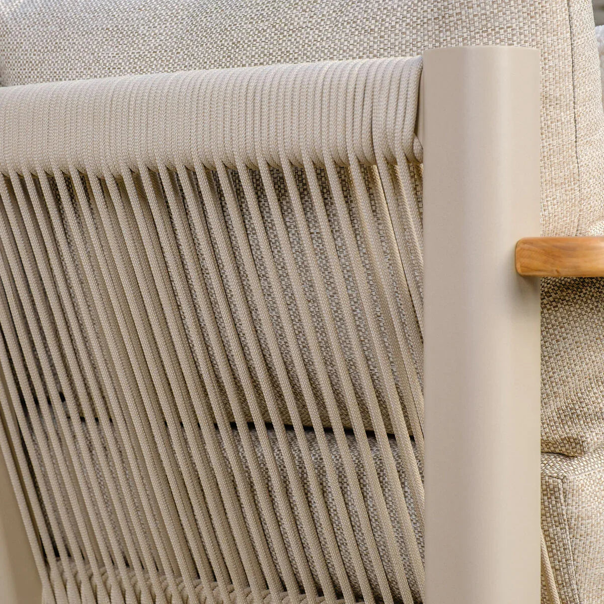 Beige rope-back outdoor sofa with textured cushions and metal frame close-up