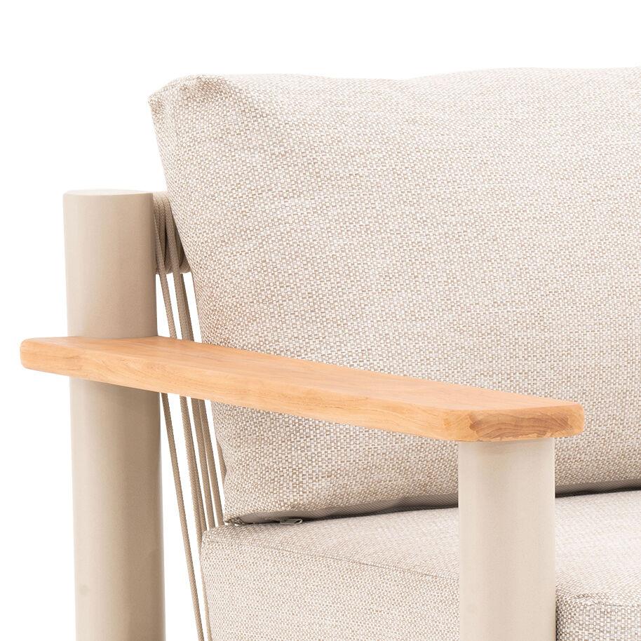Beige outdoor sofa closeup with light wood armrest, metal frame, and textured cushions