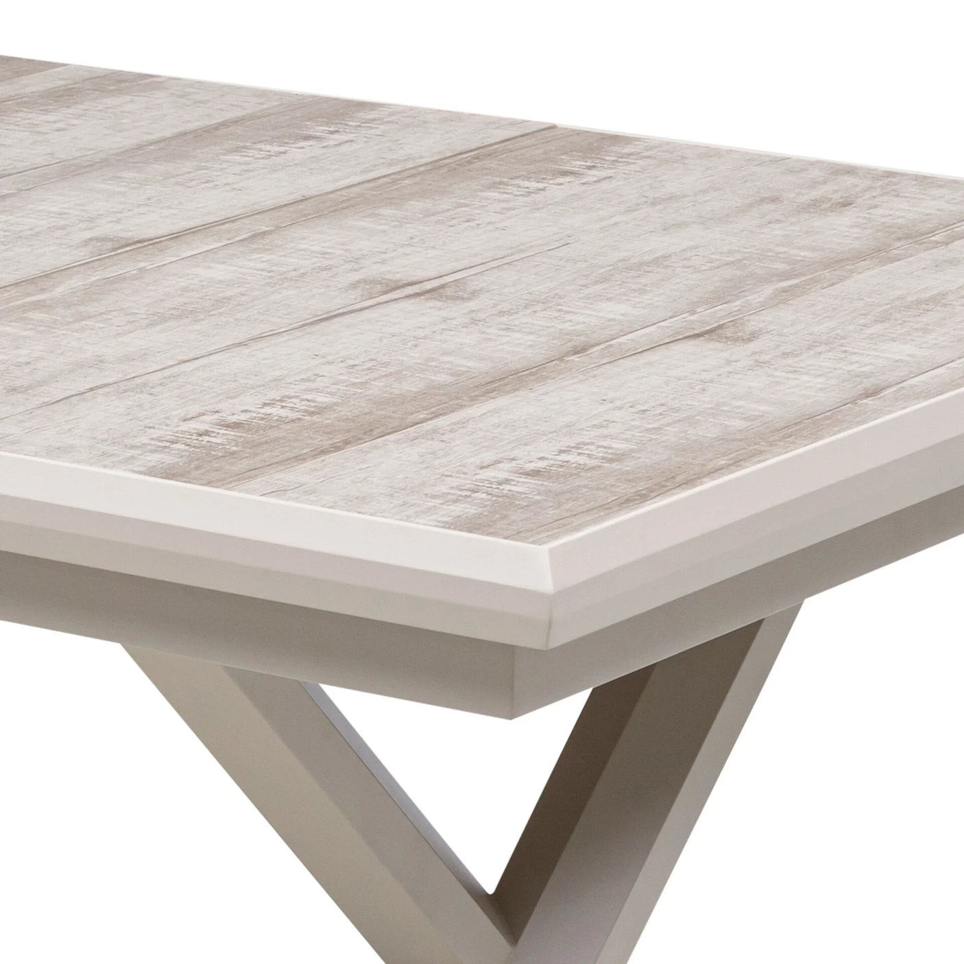 Light wood effect dining table with angled metal legs, close-up of tabletop corner
