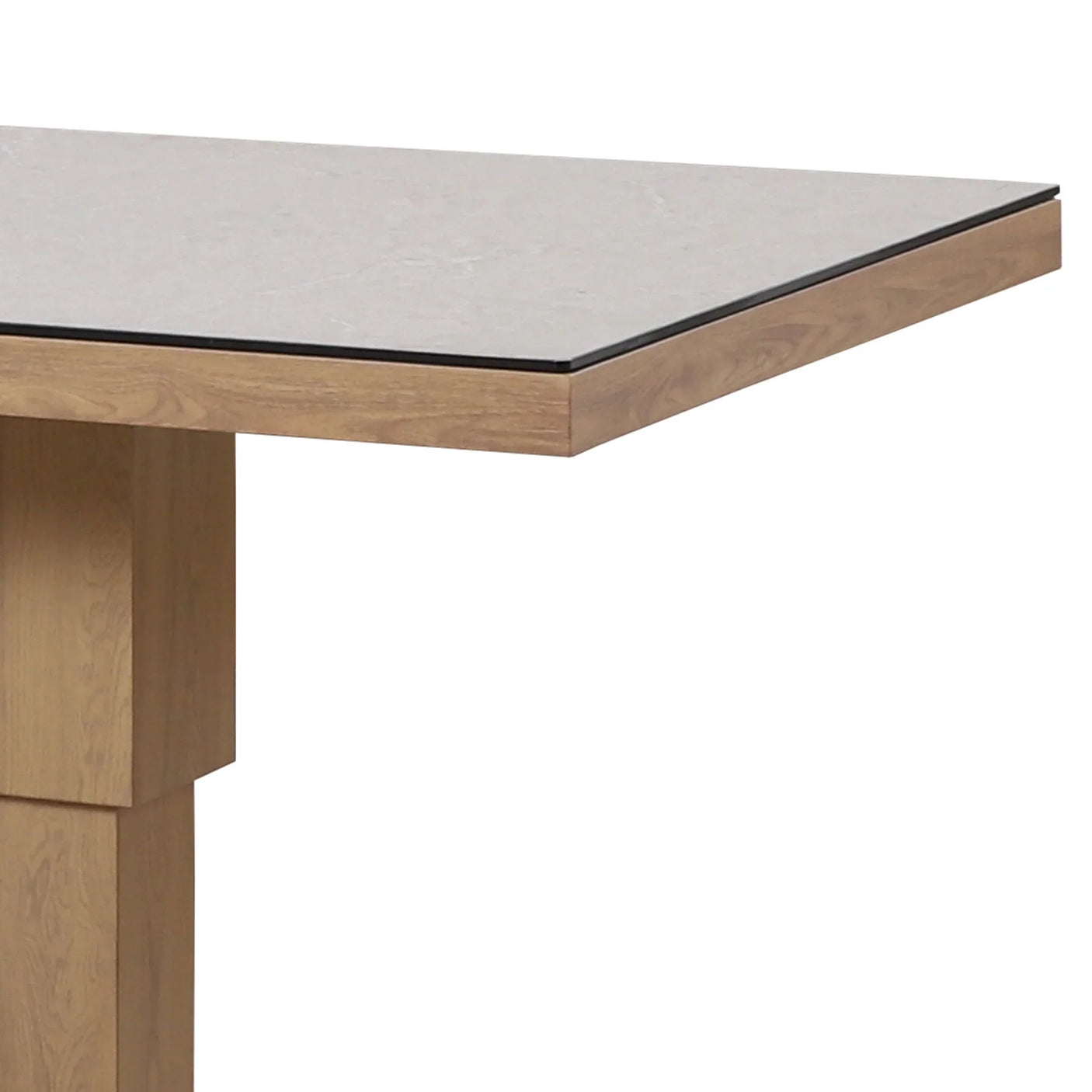 Rectangular dining table with light wood base and marble effect top, corner angle view