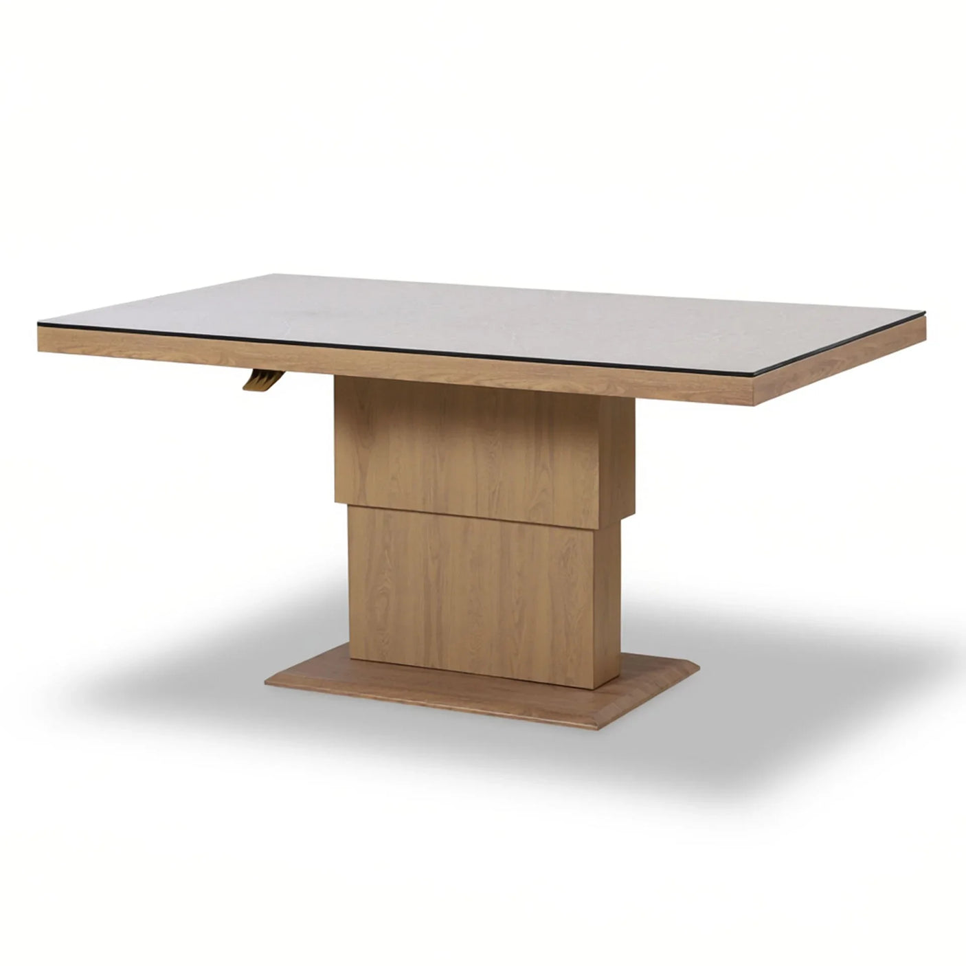 Rectangular dining table with light wood base and smooth stone-effect tabletop