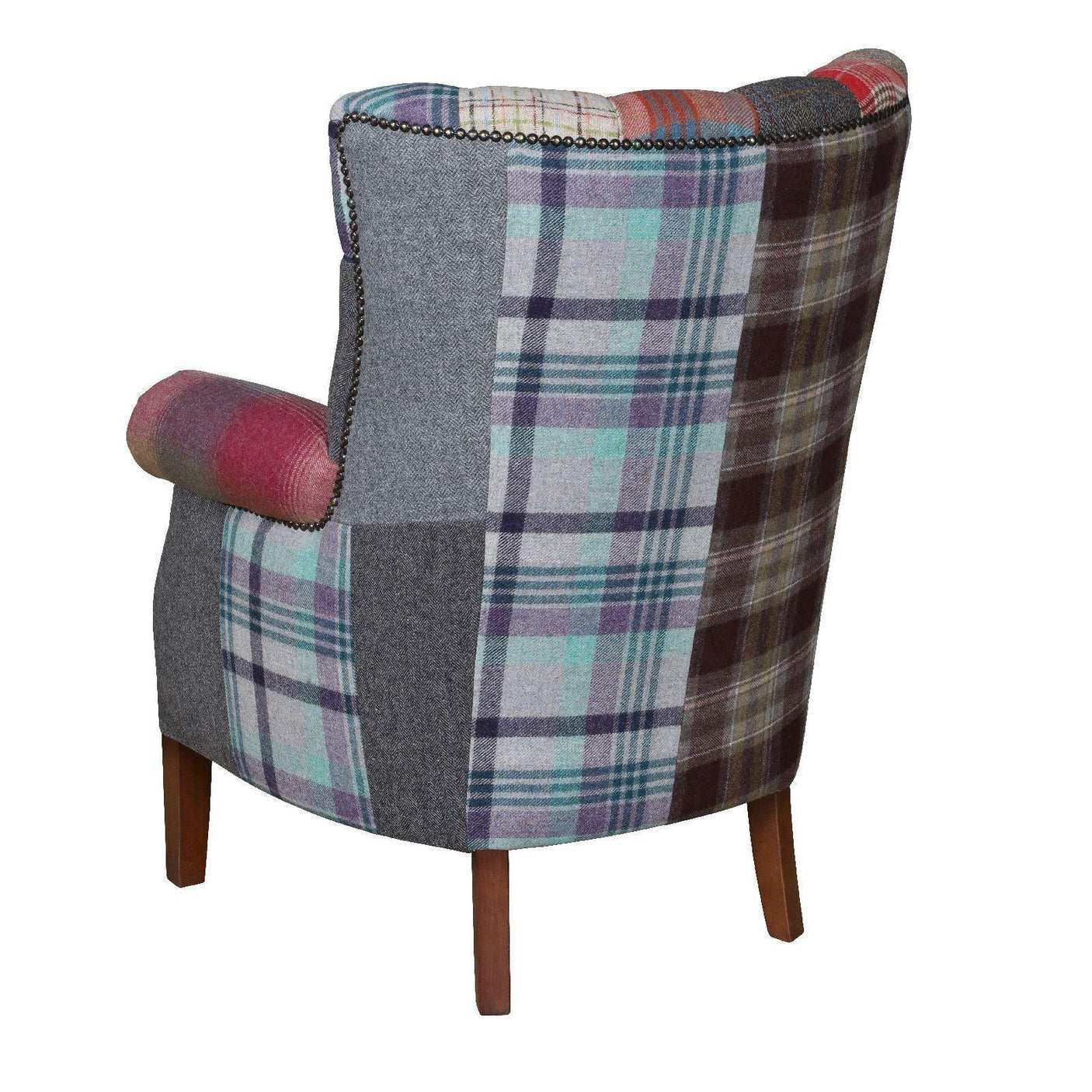 Patchwork armchair with tartan and solid fabric, wooden legs, rear angled view