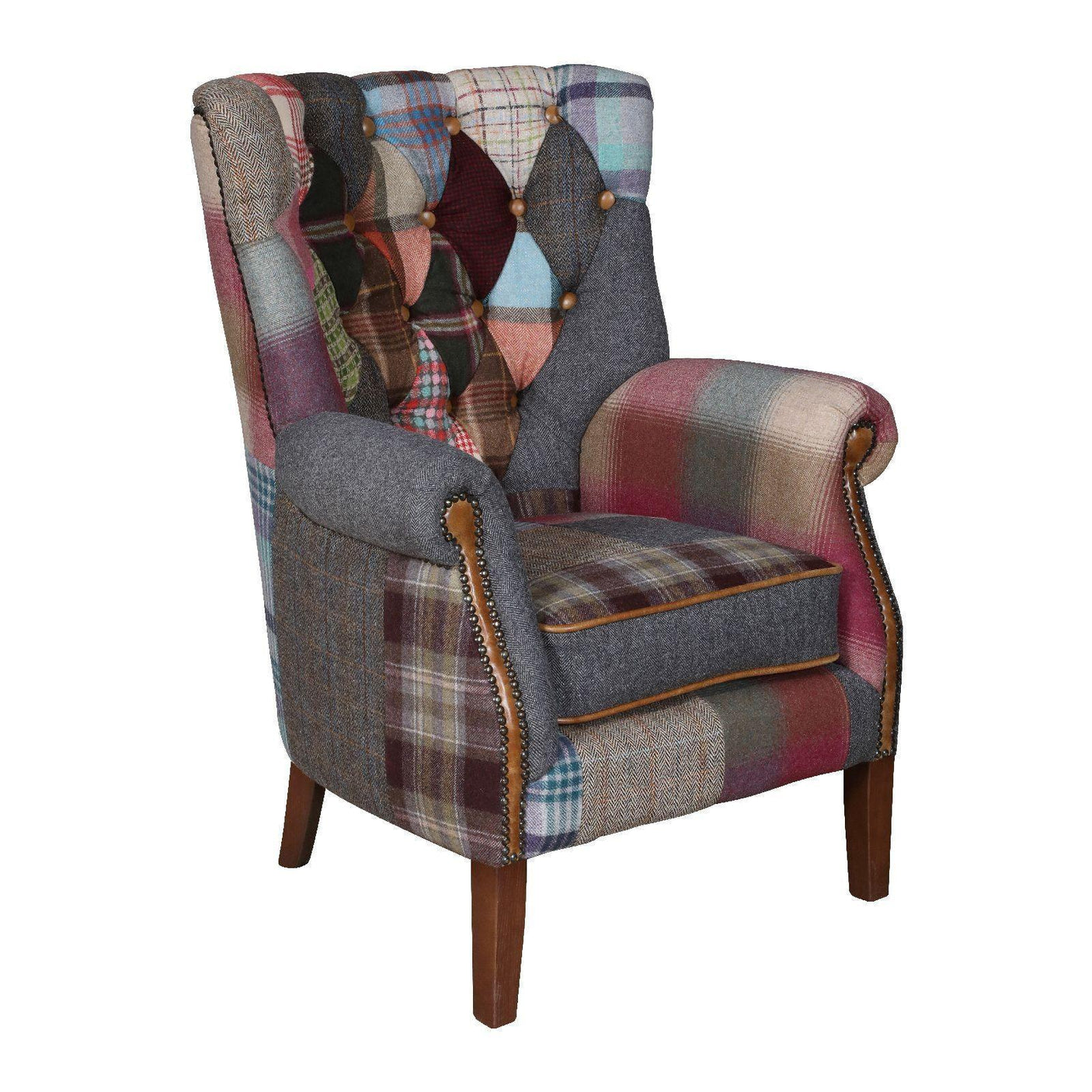 Patchwork fabric armchair with buttoned back, rolled arms, and wooden legs
