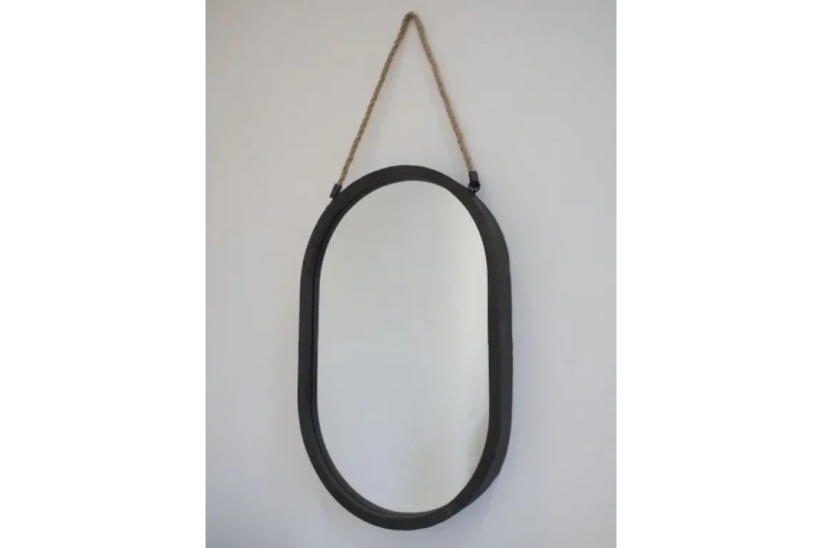 Oval wall mirror with black frame and rope hanger against a white background