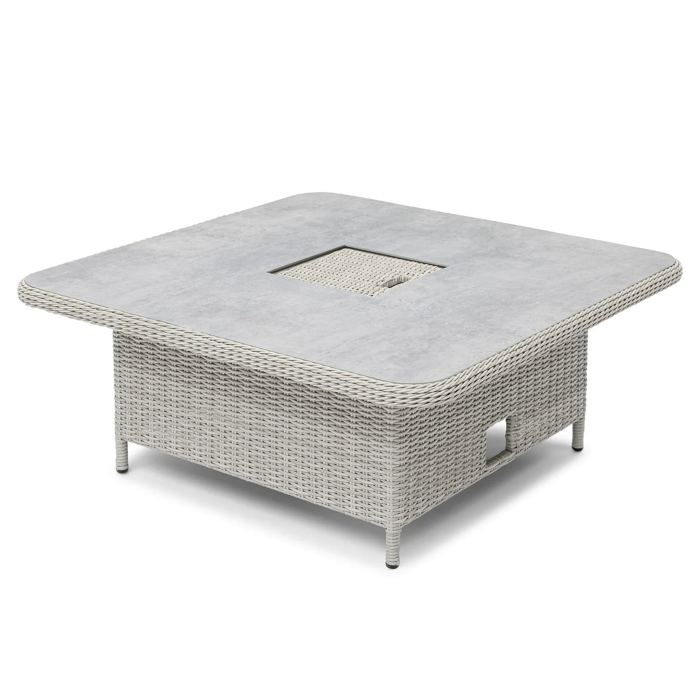 Square rattan outdoor dining table with grey stone-effect top and central cutout