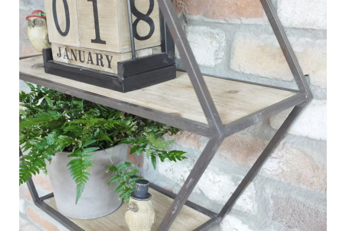 Geometric wall shelf with wood base holding potted plant, calendar block, and bird figurines