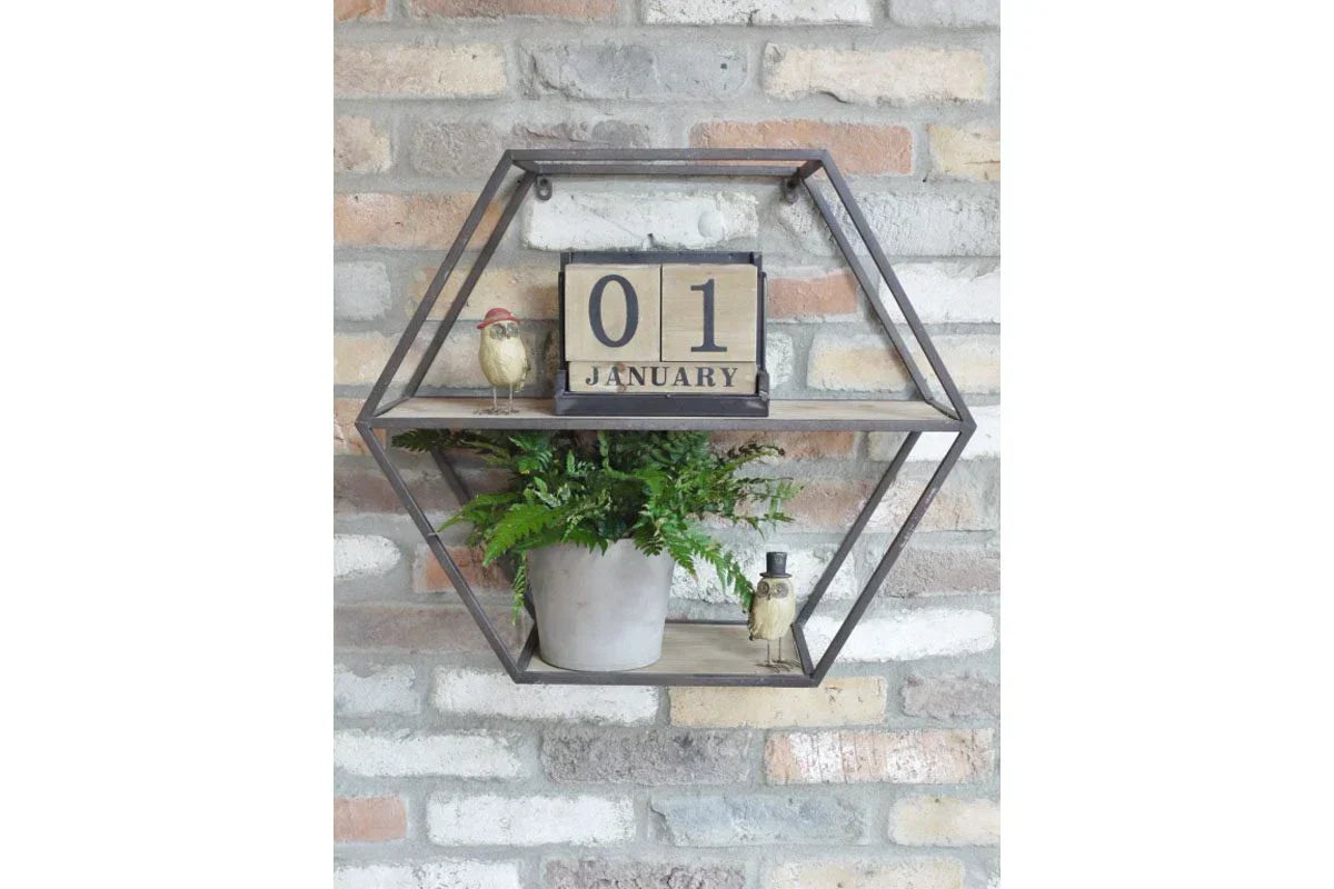 Hexagonal metal wall shelf with calendar block, potted plant, and two decorative bird ornaments