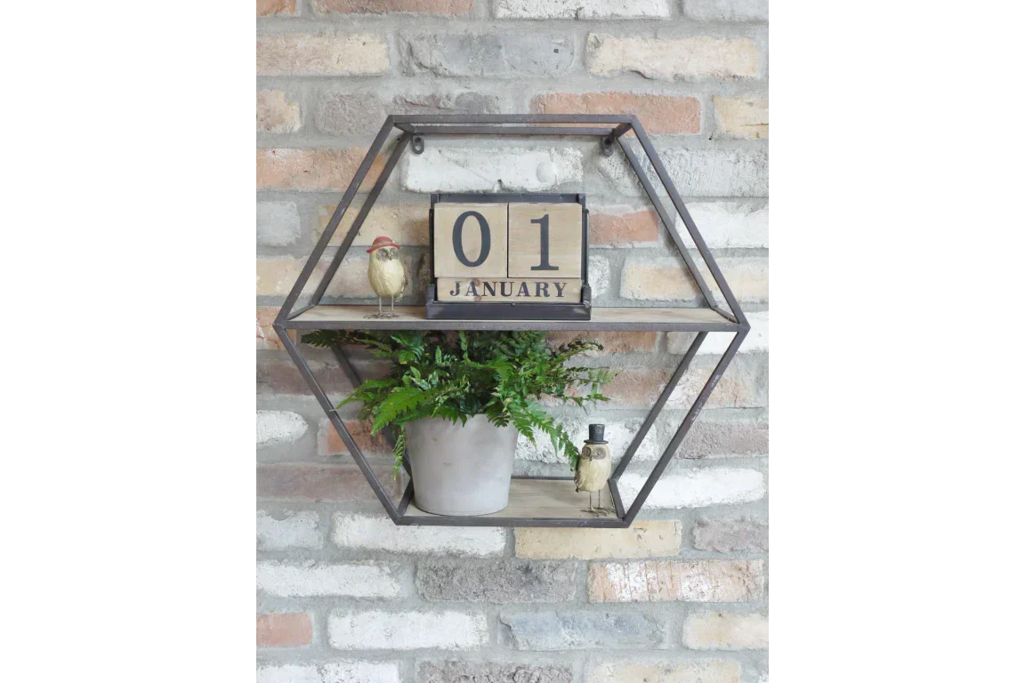 Hexagonal wall shelf with potted fern, calendar block, and decorative birds on brick wall