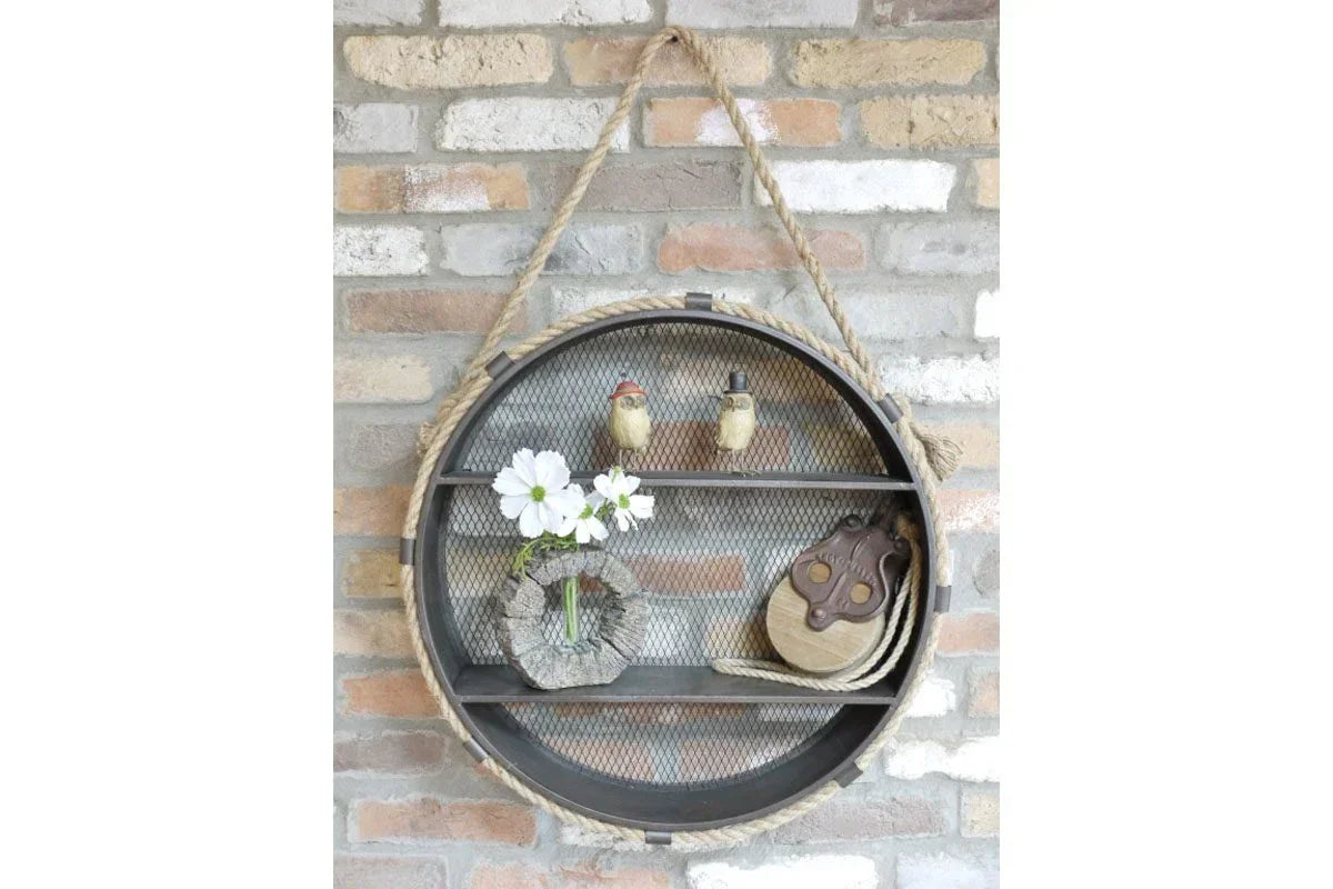 Round industrial wall shelf with mesh backing, rope detail, and decorative ornaments
