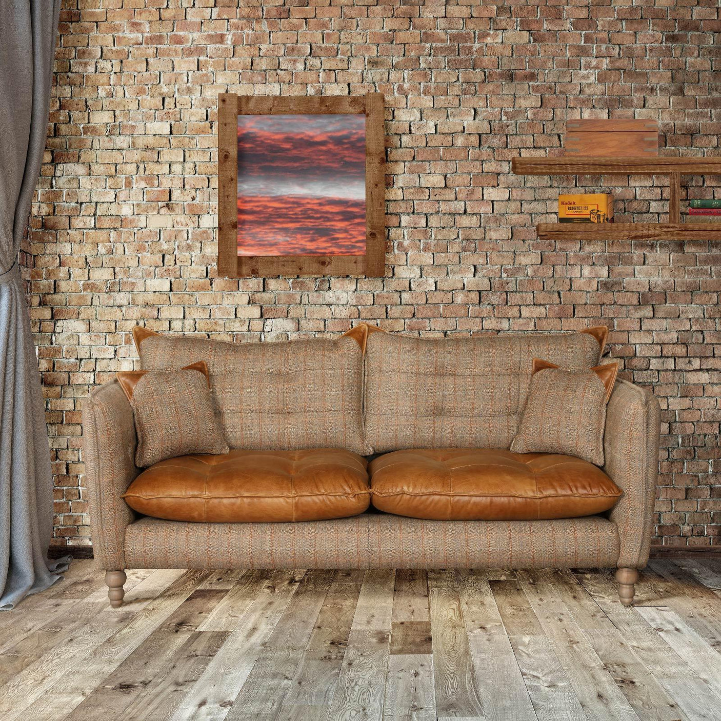 Brown leather and fabric sofa with cushions against exposed brick wall in living room