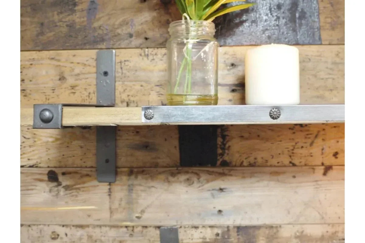 industrial wall shelf with metal brackets, wood plank, jar vase and white candle