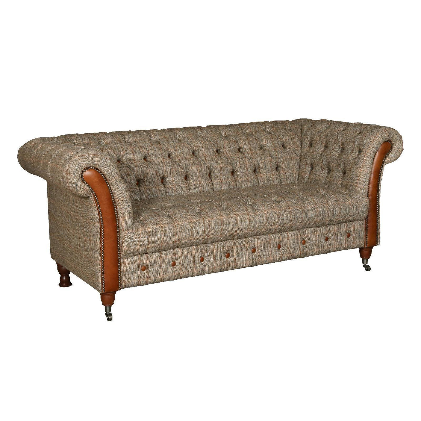 Chesterfield sofa with brown tweed fabric, tufted back, and leather scroll arms on castor legs