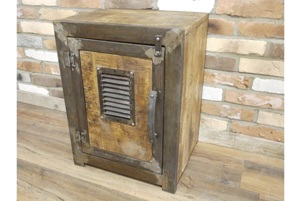 Industrial wood and metal side cabinet with vented door, rustic finish, placed on wood floor