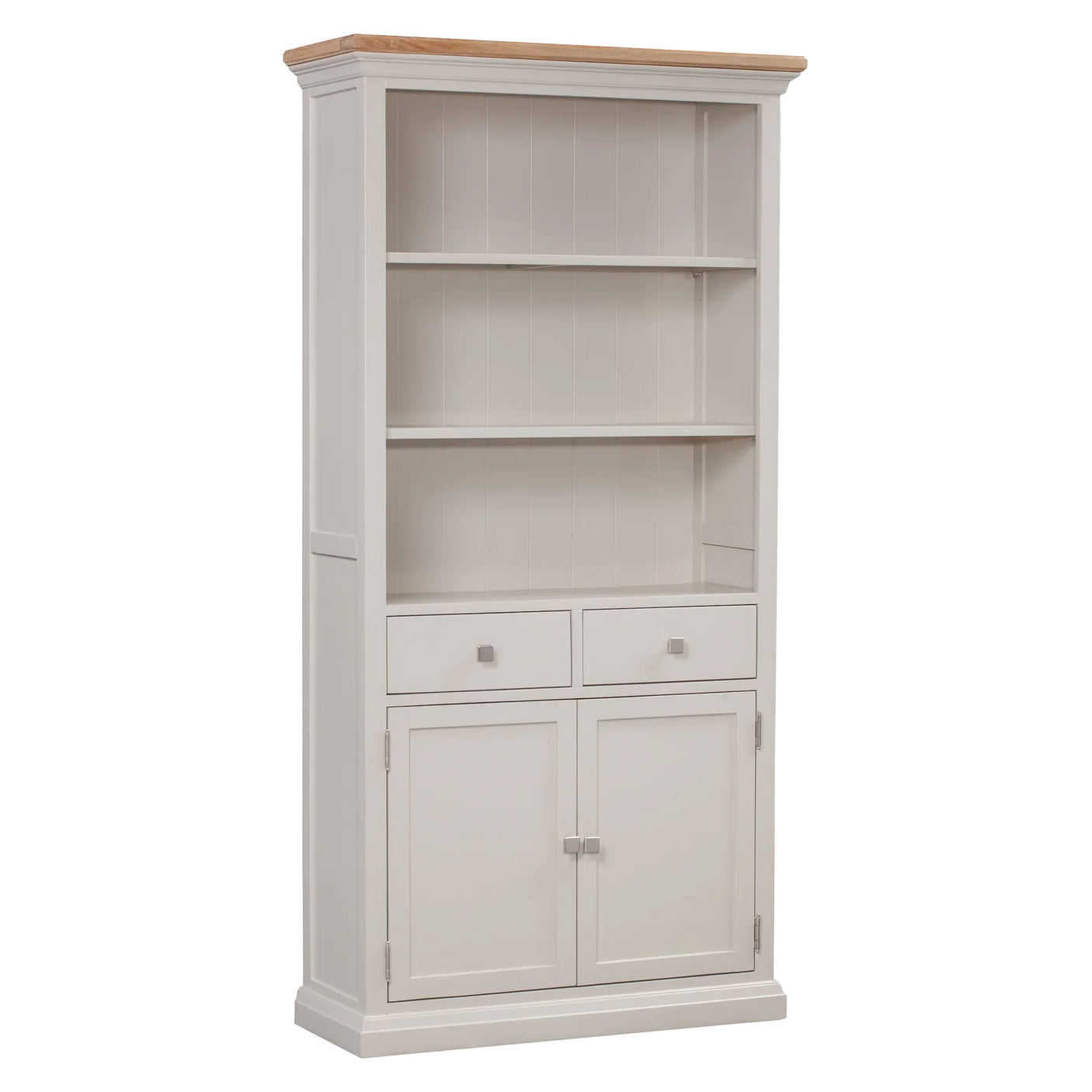 White wooden bookcase with two open shelves, two drawers, and double door cupboard