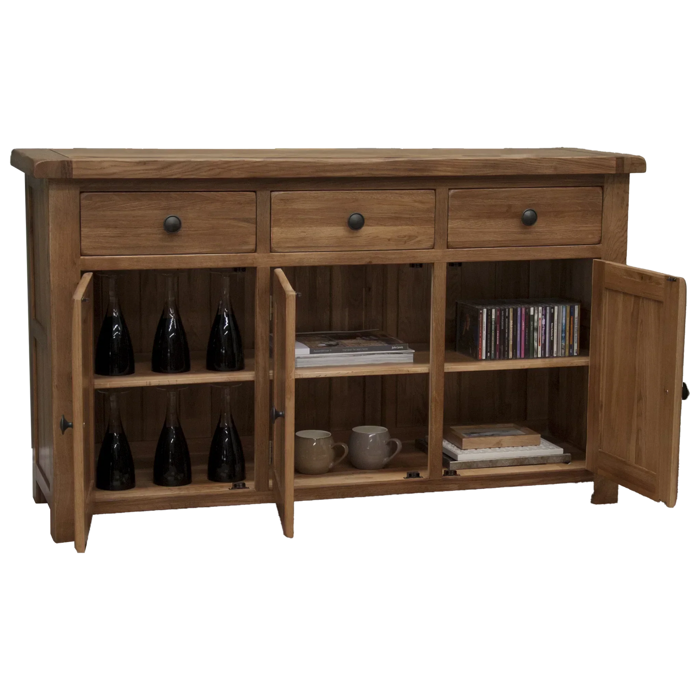 Oak sideboard with three drawers and open cupboards displaying bottles, cups, and CDs