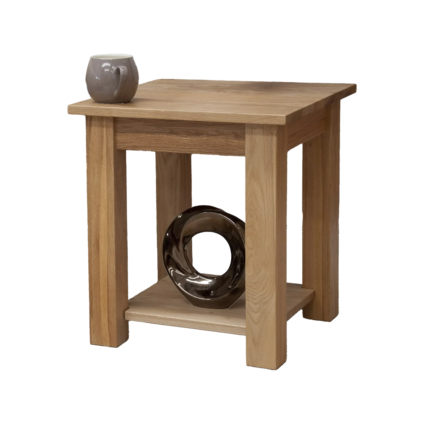 Oak side table with lower shelf, grey mug and decorative loop accent