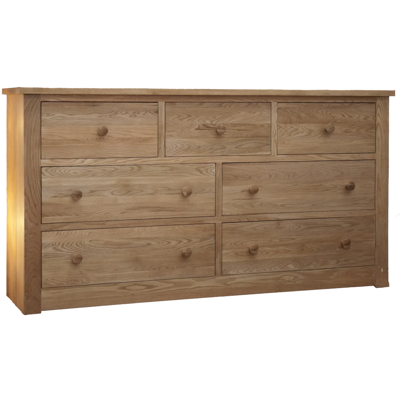 Natural oak chest of drawers with seven drawers and wooden knobs, front angle view