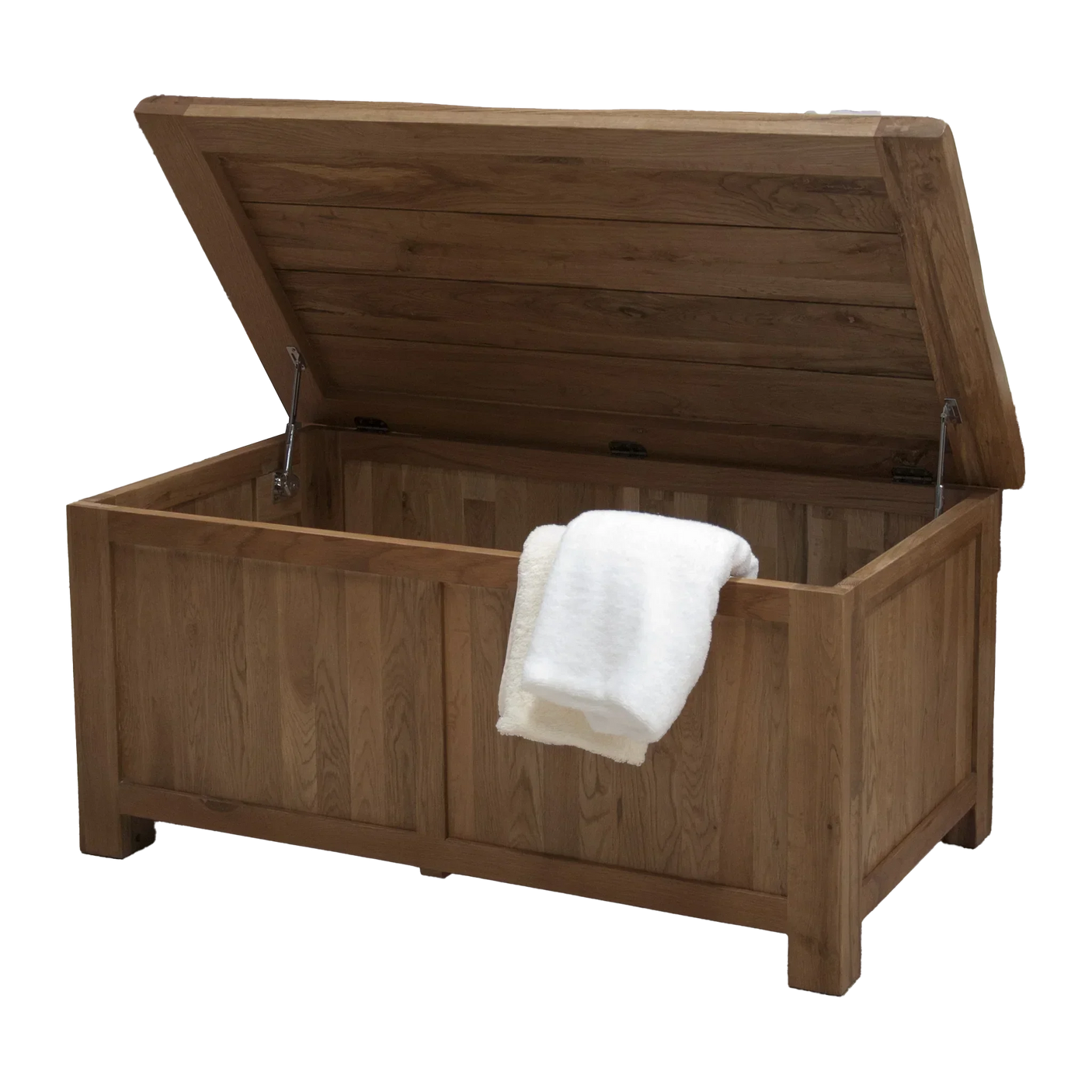 Oak blanket box with open lid and white throw draped over edge