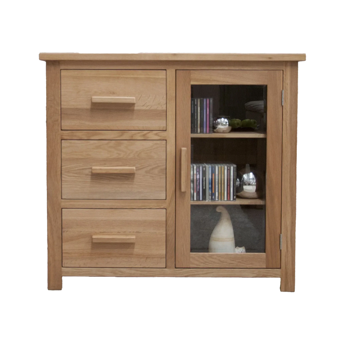 Oak sideboard with three drawers and glass display cabinet, shelves holding decor and CDs