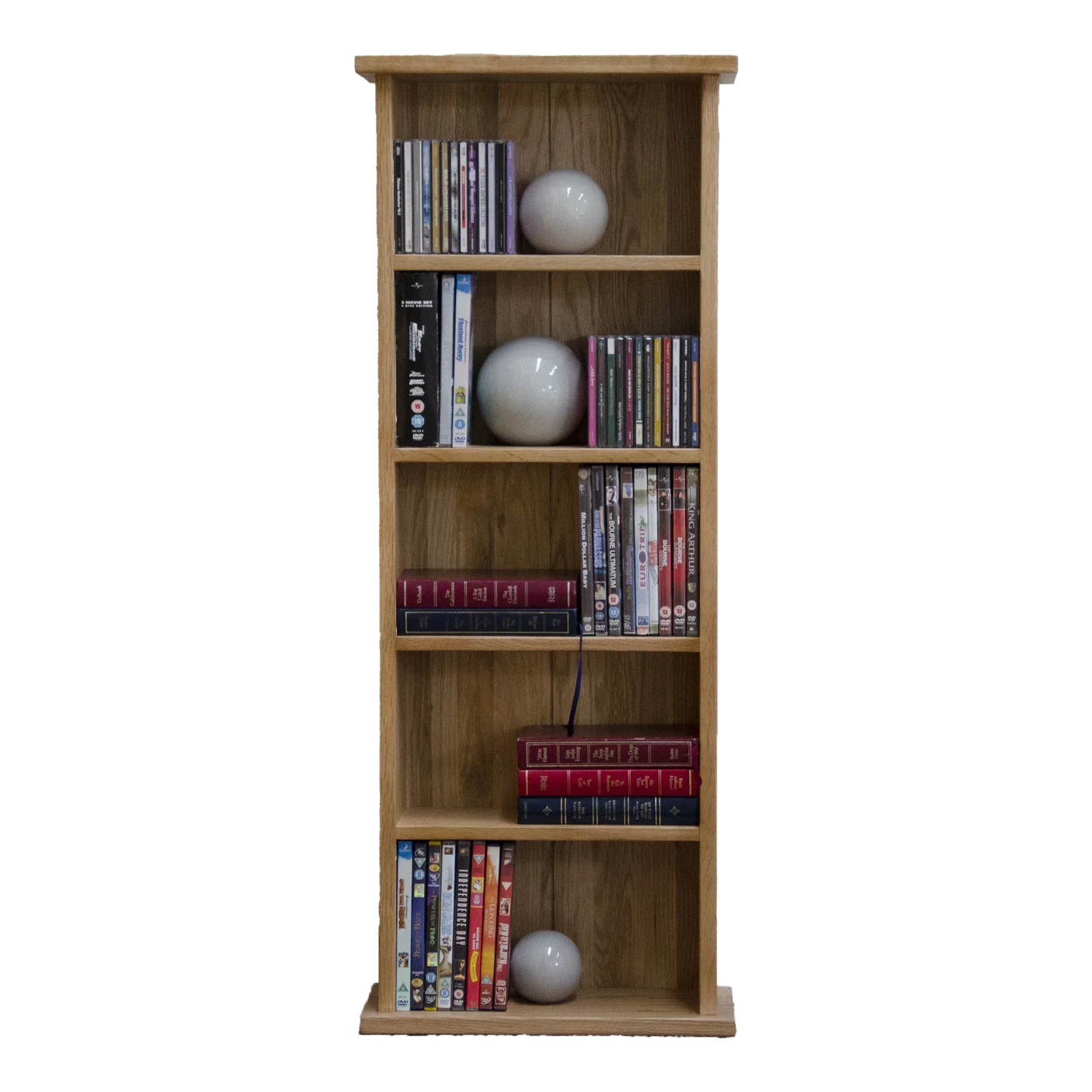 Tall oak bookcase with shelves holding books, DVDs, and decorative ornaments